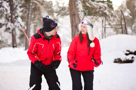 Skiing, snow, winter fun, happy family is skiing in the forest.の写真素材