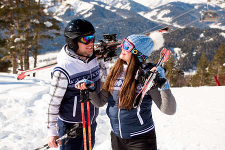 Winter vacation - portrait of skiers in ski resort.の写真素材