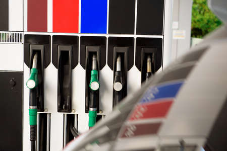 Green and yellow colorful fuel, gas station. Gas station in operation.