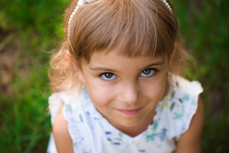 Llittle girl child outdoor in summer day.の写真素材