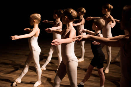 A large group of children rehearsing and dancing the ballet.の写真素材