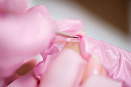 Women doing manicure. Small business existence at COVID-19 lockdown concept.の写真素材