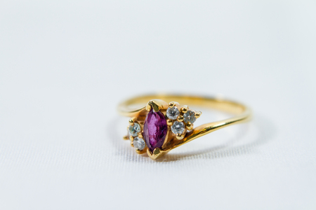 Ruby surrounded by small diamond engegement ringの写真素材