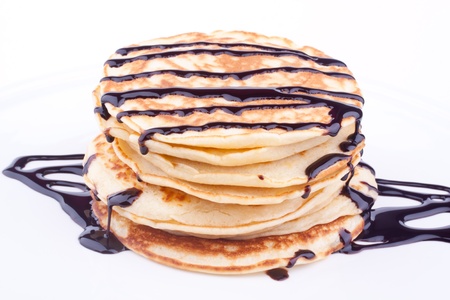 stack of pancakes with chocolate sauceの写真素材