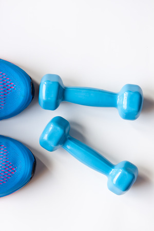 dumbbells and sport shoesの写真素材