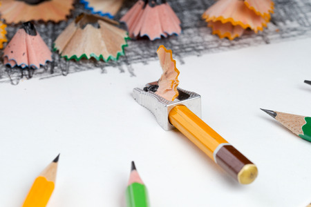 Pencil sharpener shavings on the white paper. Back to schoolの写真素材