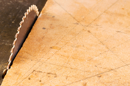 Carpenter tools on wooden table with sawdust. Circular Saw. Carpの写真素材