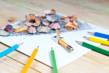Pencil sharpener shavings on the white paper. Back to school. Copy space.の写真素材