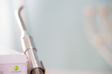 Stomatological instrument in the dentists clinic. Dental background: work in clinic. Operation, tooth replacement.の写真素材