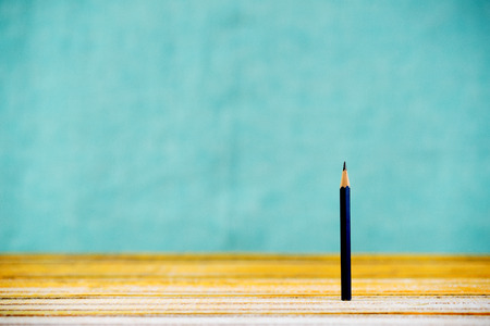 Pencil on a wooden table. Back to school. Copy space.の写真素材