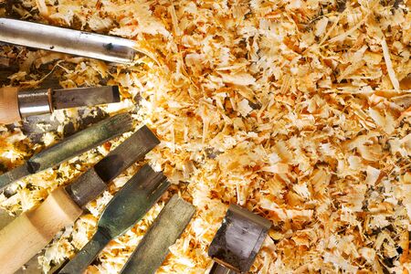 Carpenter tools on wood table background. Top view