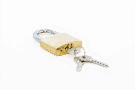 Padlock with key isolated on white backgound.の写真素材