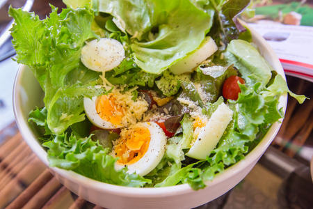 Tuna and vegetable salad with boiled eggの写真素材