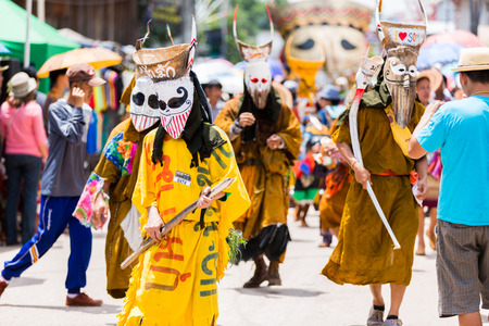 LOEI ,THAILAND-JUNE 28: Ghost Festival "Phi Ta Khon". The mask procession celebrated in Thailand, The Thai Buddhist ceremony at Dansai district Loei province, on June 28,2014.のeditorial素材
