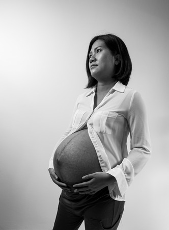 smart pregnant woman on B&W.の写真素材