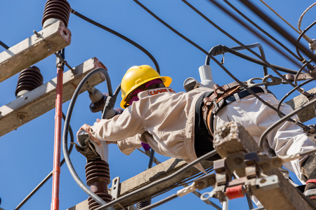 The electricial of high voltage.He working with high voltage power system.のeditorial素材