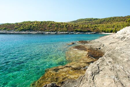beautiful rocky beach in croatiaの写真素材