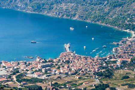 aerial view to the komiza town in Croatiaの写真素材