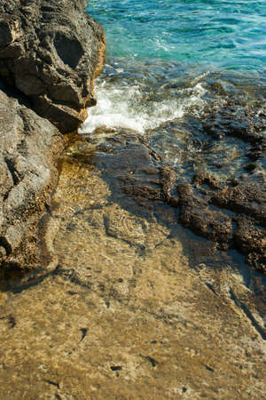 beautiful rocky beach in croatiaの写真素材