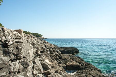 beautiful rocky beach in croatiaの写真素材