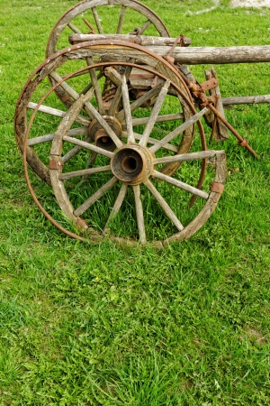 old broken wooden wheel spokes, side by chariotの写真素材
