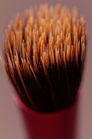 yellow black makeup brushes closeup picturesの写真素材