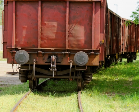 Old wagon, in an unused grassy railway trackの写真素材