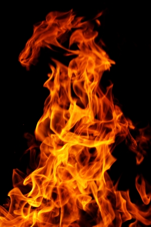 red flames of fire as red black backgorundの写真素材