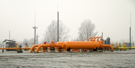 orange gas pipe in frosted winterの写真素材