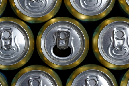 Much of drinking cans close up, one is openの写真素材