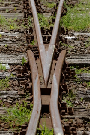 rusty railway track crossingの写真素材