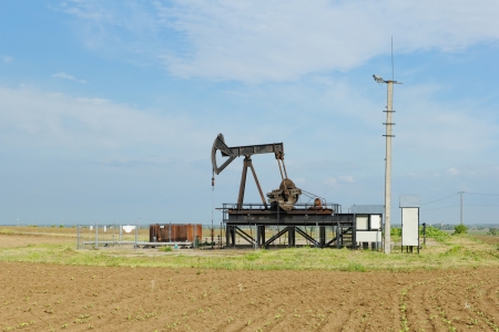 Operating oil and gas well in desertの写真素材