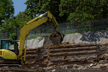 the excavator working on a construction siteの写真素材