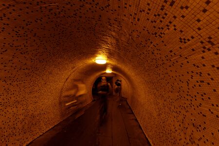 pedestrian tunnel in the nightの写真素材