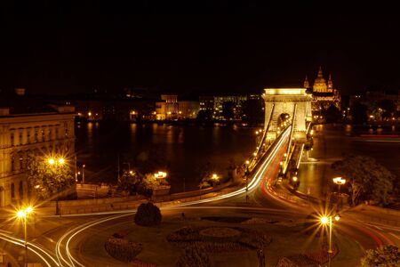 Night image with traffic of the hungarian chain Bridge extremly high donauの写真素材