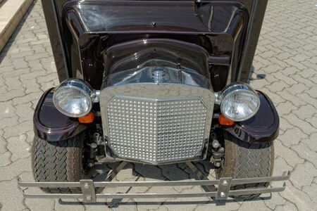 front of small electric carの写真素材