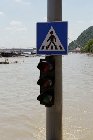 traffic light on flooding riverの写真素材