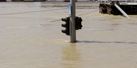 traffic light on flooding riverの写真素材