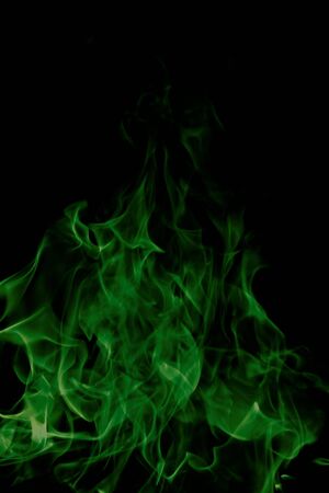 green flames of fire as  abstract backgorundの写真素材