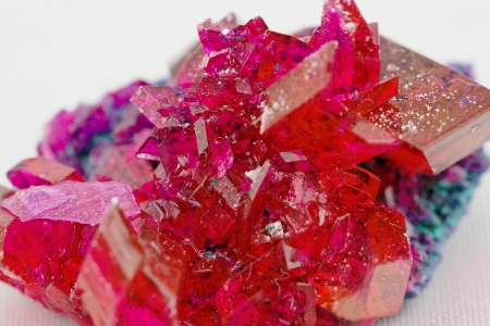 close up of crystals in ruby color on white background (red crystal)の写真素材