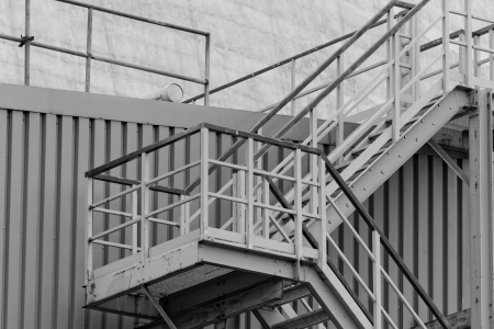 industrial stairs with stair railing wide by buildingの写真素材