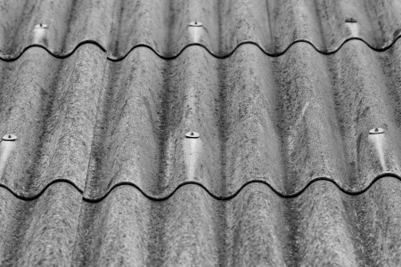 monochrome texture of gray corrugated slate roofの写真素材