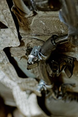 repair a broken fuel pipe with rubber pipeの写真素材