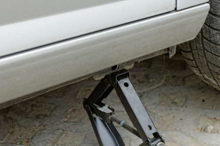 Car lifting for service with handlifterの写真素材