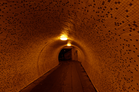 pedestrian tunnel in the nightの写真素材