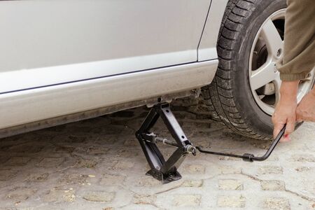 Car lifting for service with handlifterの写真素材