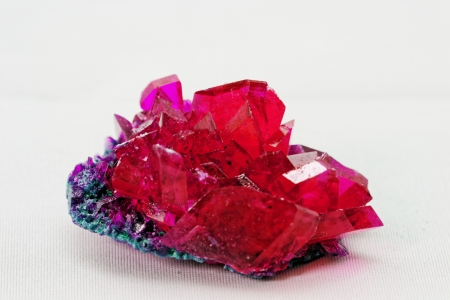 close up of crystals in ruby color on white background (red crystal)の写真素材