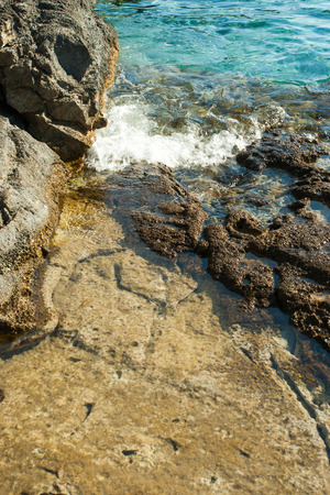 beautiful rocky beach in croatiaの写真素材