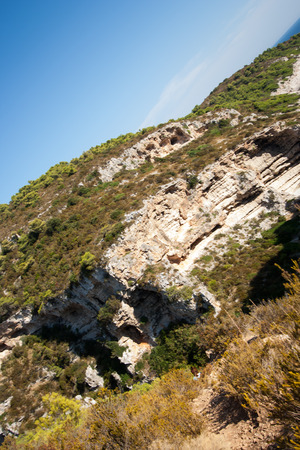 rocky scrubby landscape from vis island (croatia)の写真素材