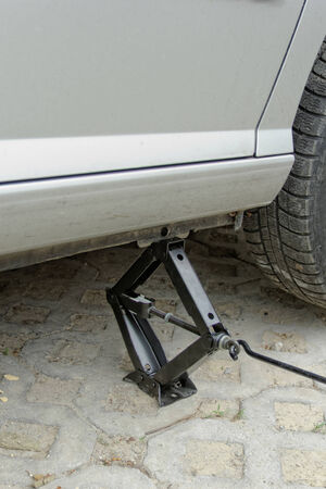 Car lifting for service with handlifterの写真素材